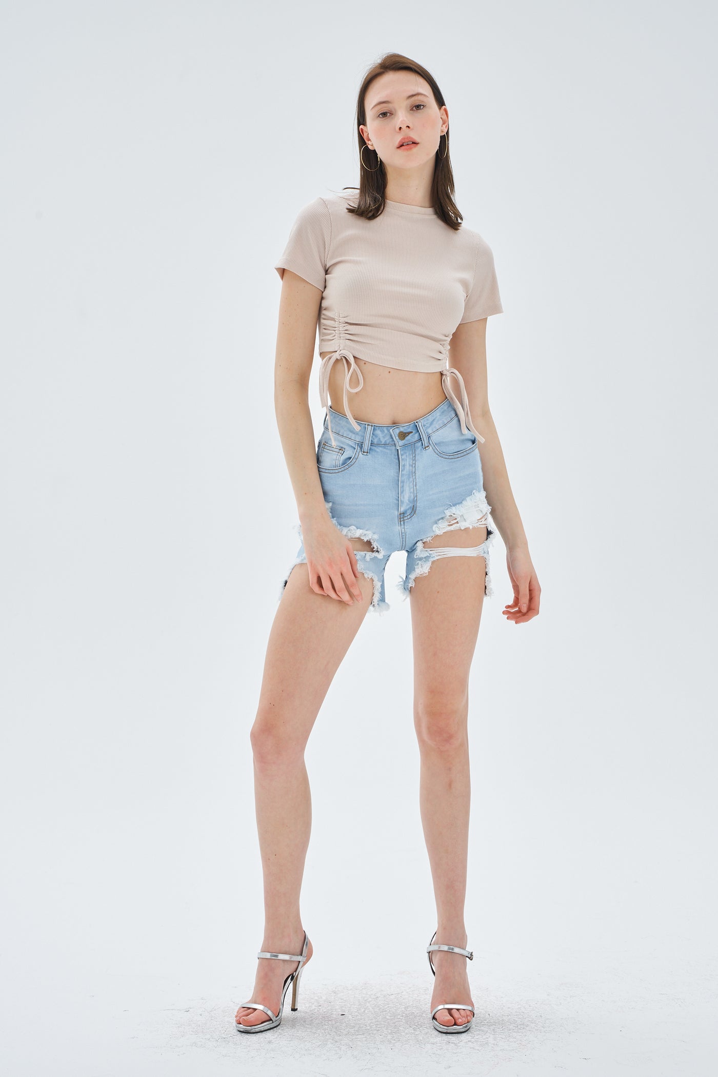 CUT OUT RIPPED DENIM SHORTS